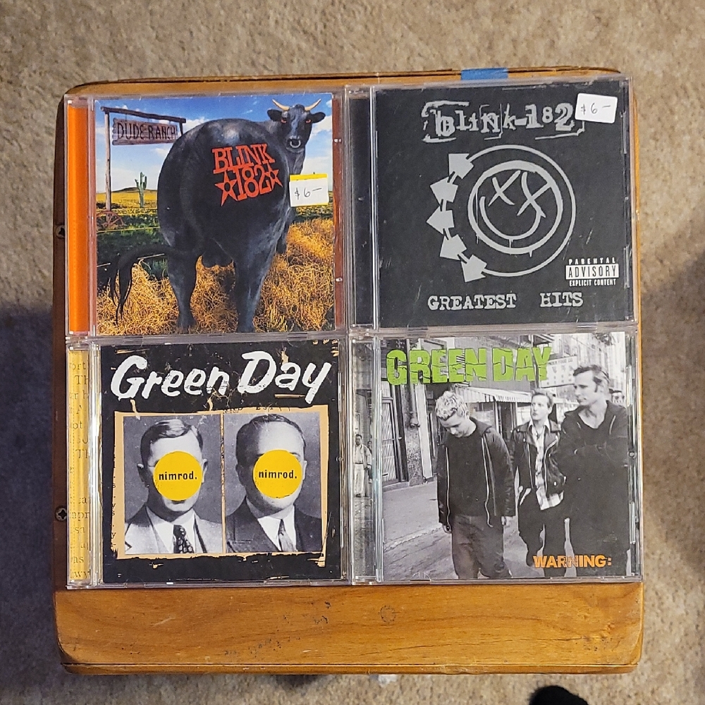 Blink-182 and Green Day CDs